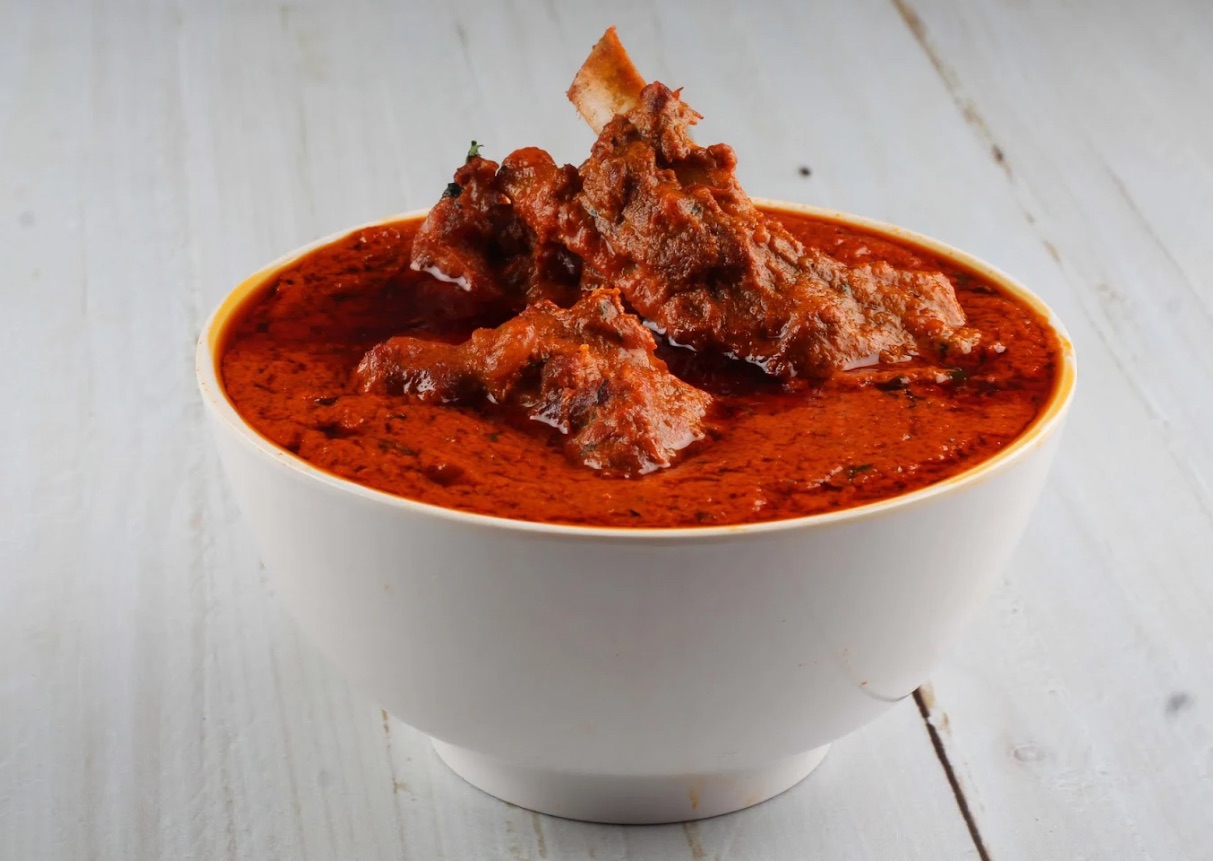 Mutton curry in a white bowl